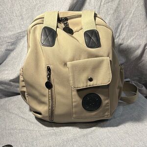 Stylish Beige Backpack with Black Details